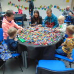 childen playing with lego in playground